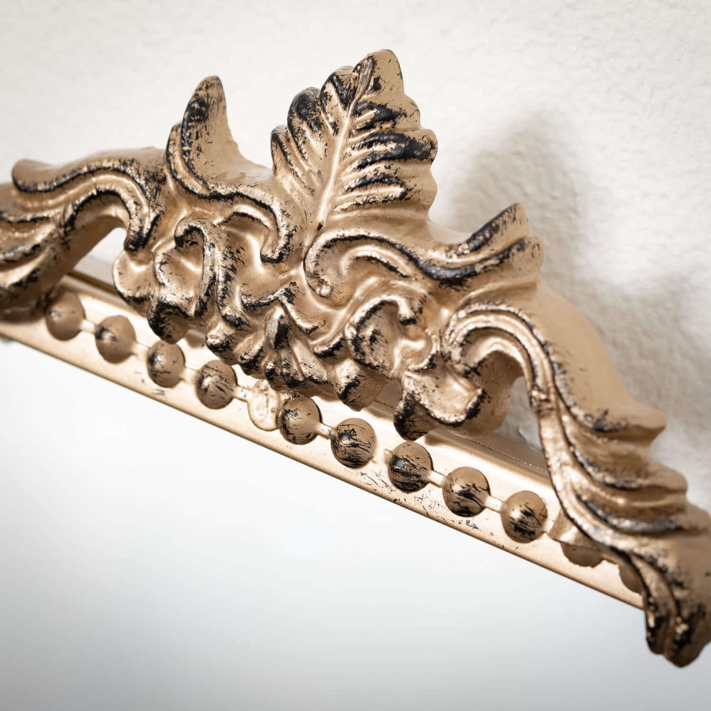 Elongated Gold Trimmed Mirror